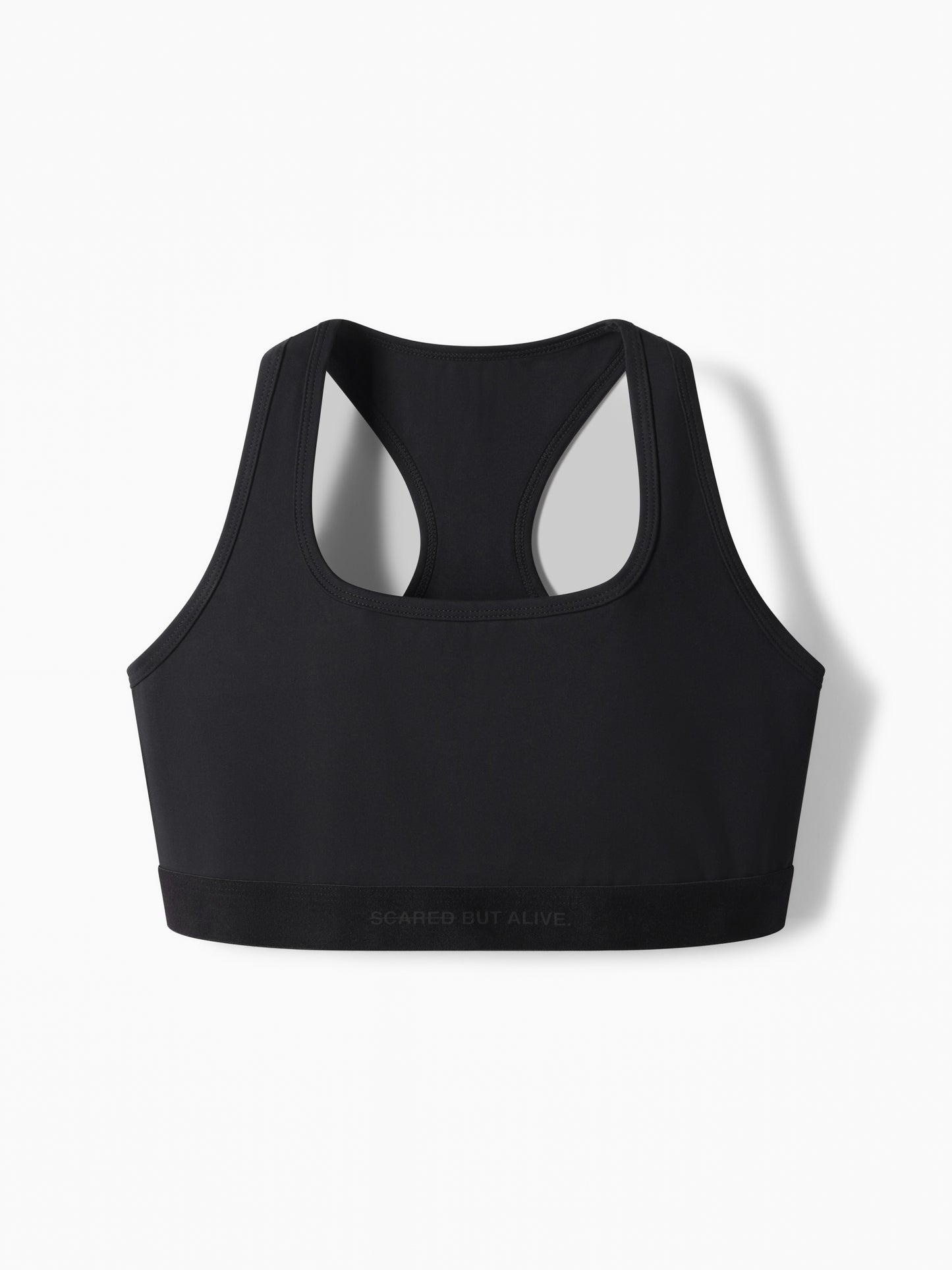 Model wearing The Sydney Binder Bra, showcasing the side coverage design