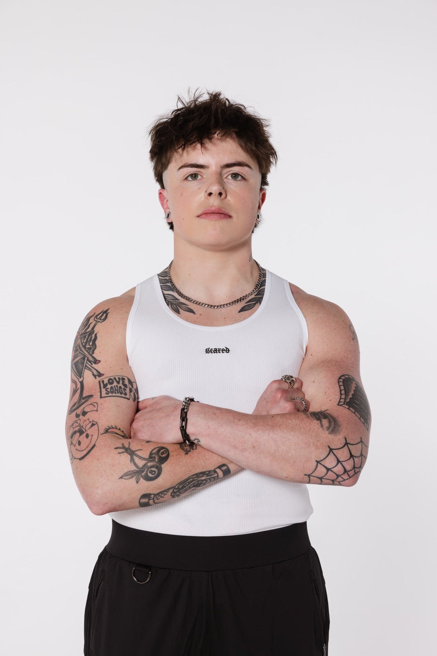 Ibiza Rib Tank White Space chest embroidery studio closeup