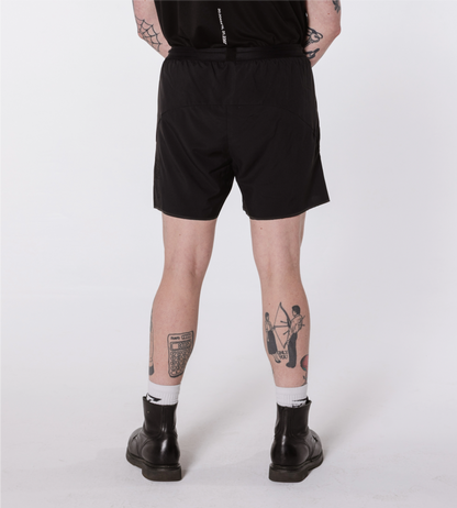 [Color: Black Out] Model wearing the Berlin Shorts, back side view