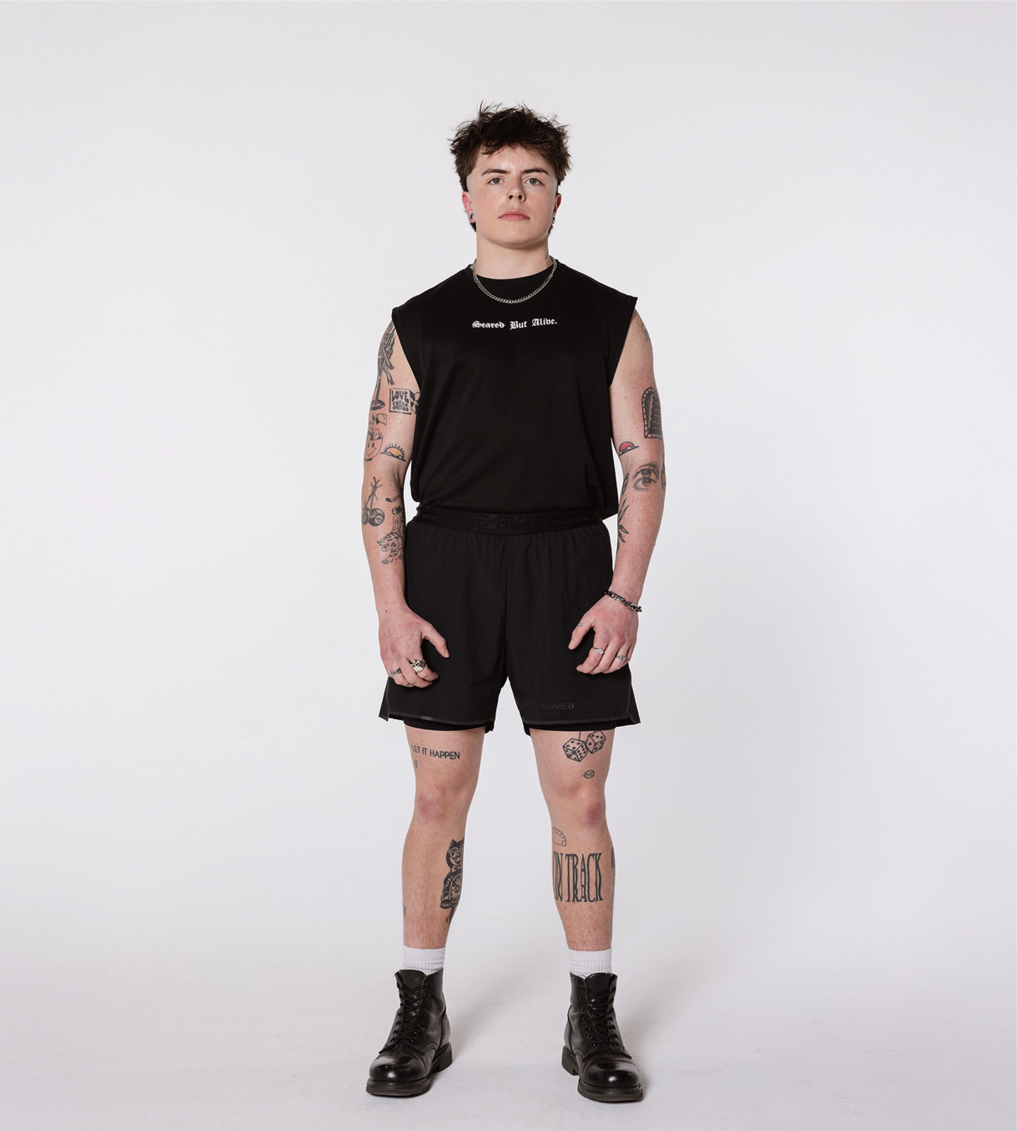 [Color: Black Out] Model wearing the Berlin Shorts and the London Tank