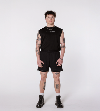 [Color: Black Out] Model wearing the Berlin Shorts and the London Tank