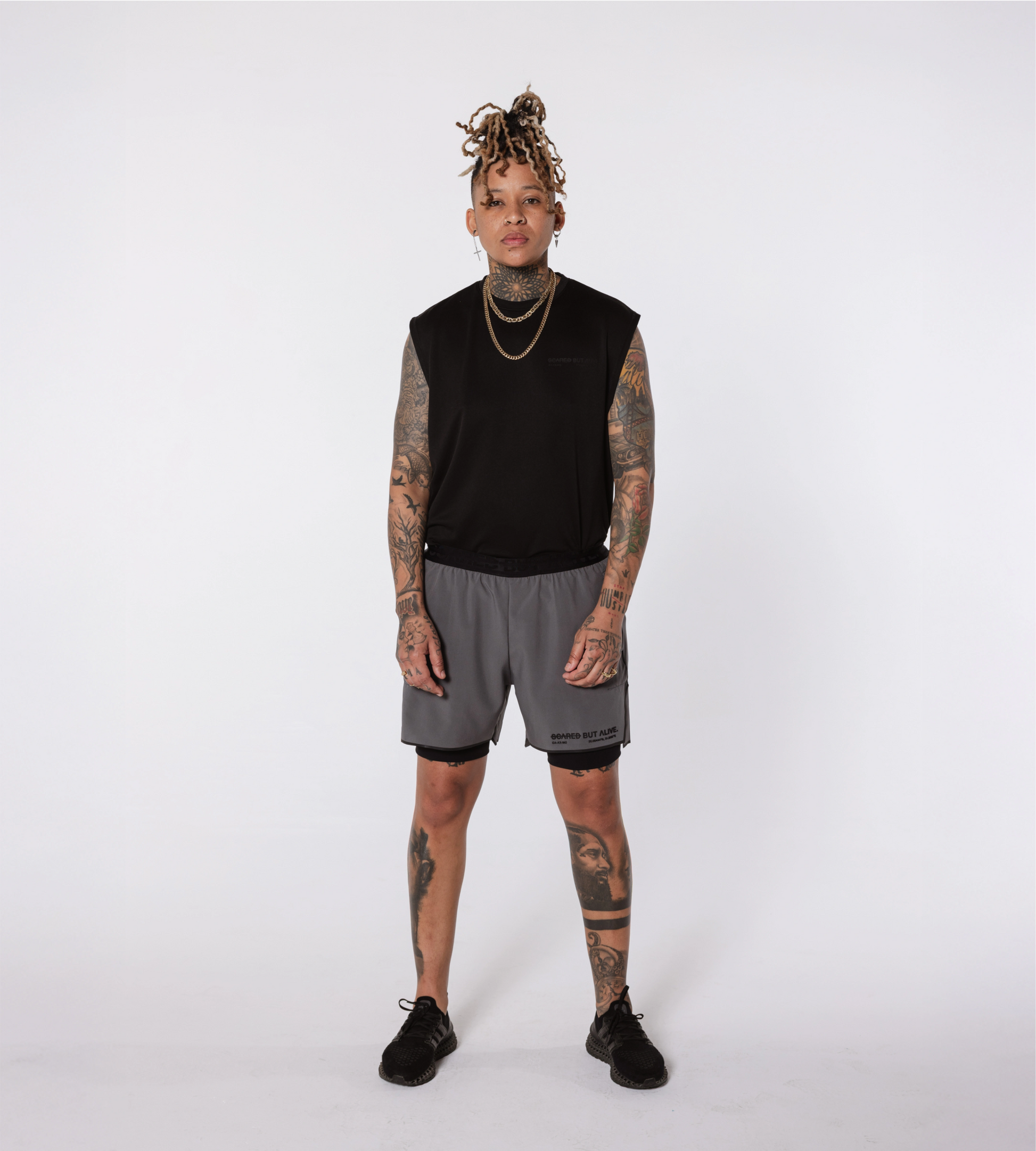 [Color: Carbon Gray] Model wearing the Berlin Shorts and Stockholm Tank