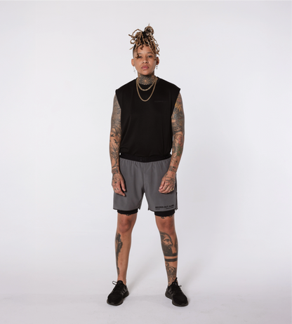[Color: Carbon Gray] Model wearing the Berlin Shorts and Stockholm Tank