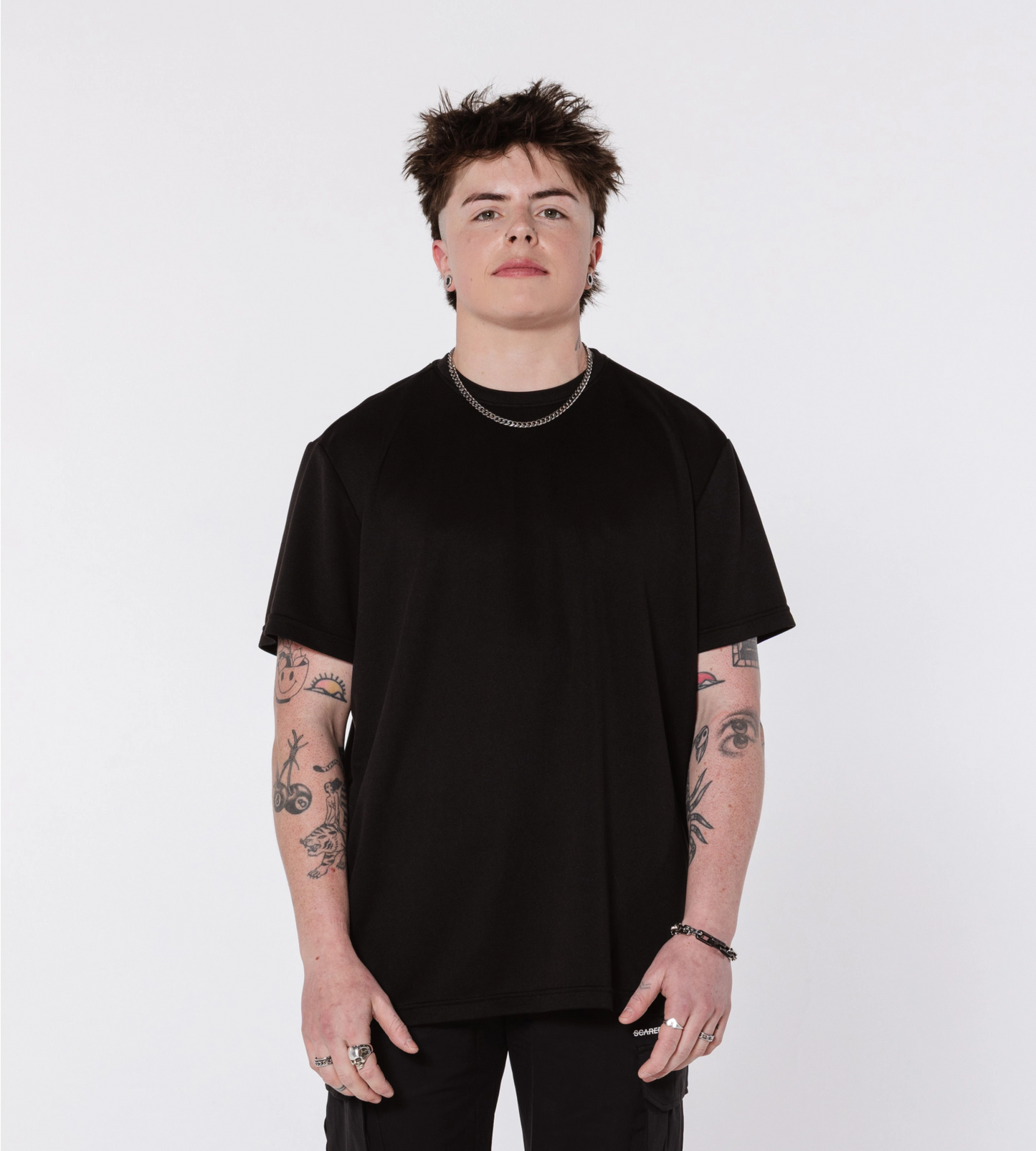 [Color: Black Out] Model wearing the Scared But Alive Bristol Tee