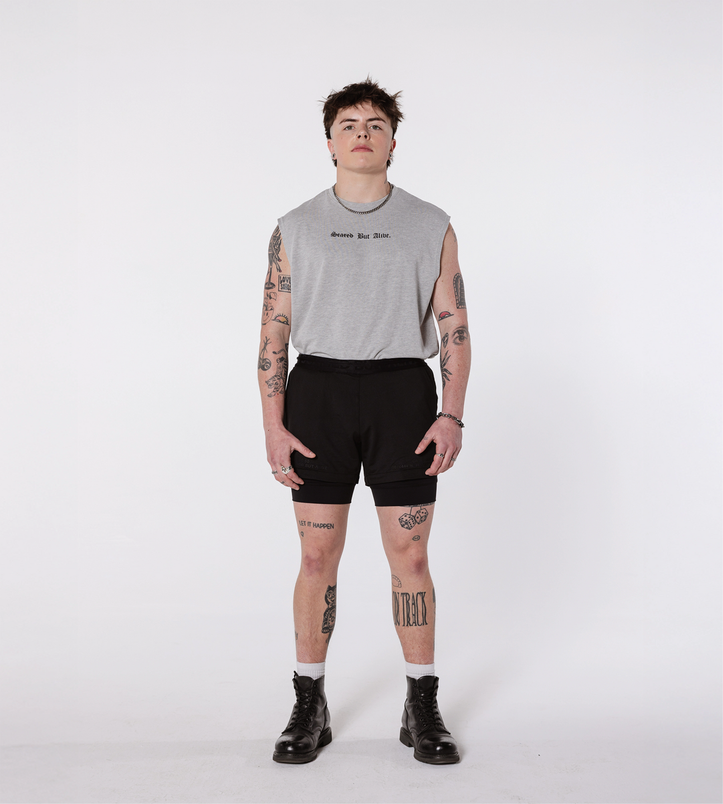 [Color: Black Out] Model wearing the Hawaii Shorts and the London Tank