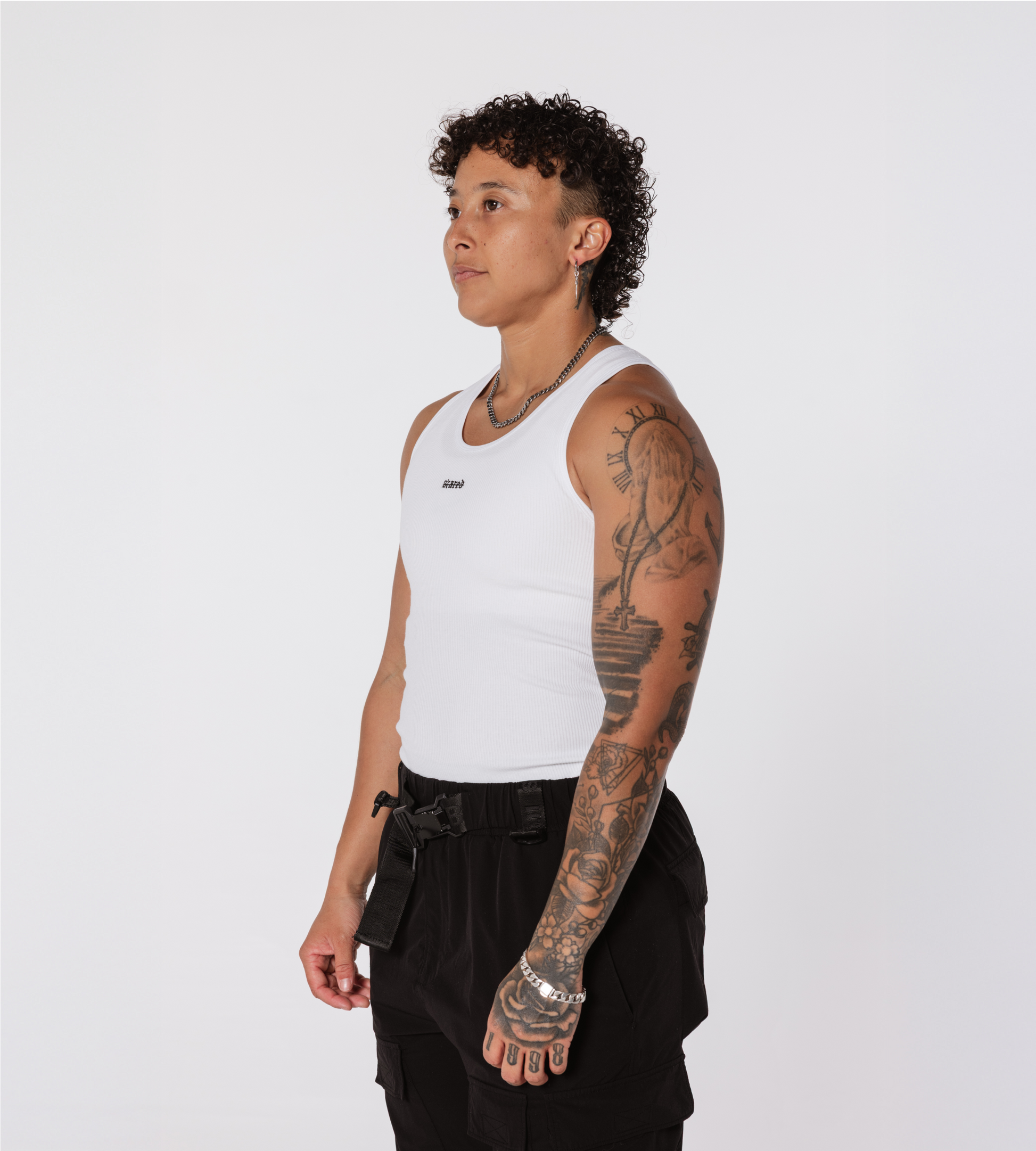 [Color: White Space] Model wearing the Ibiza Rib Tank and the Dubai Jogger