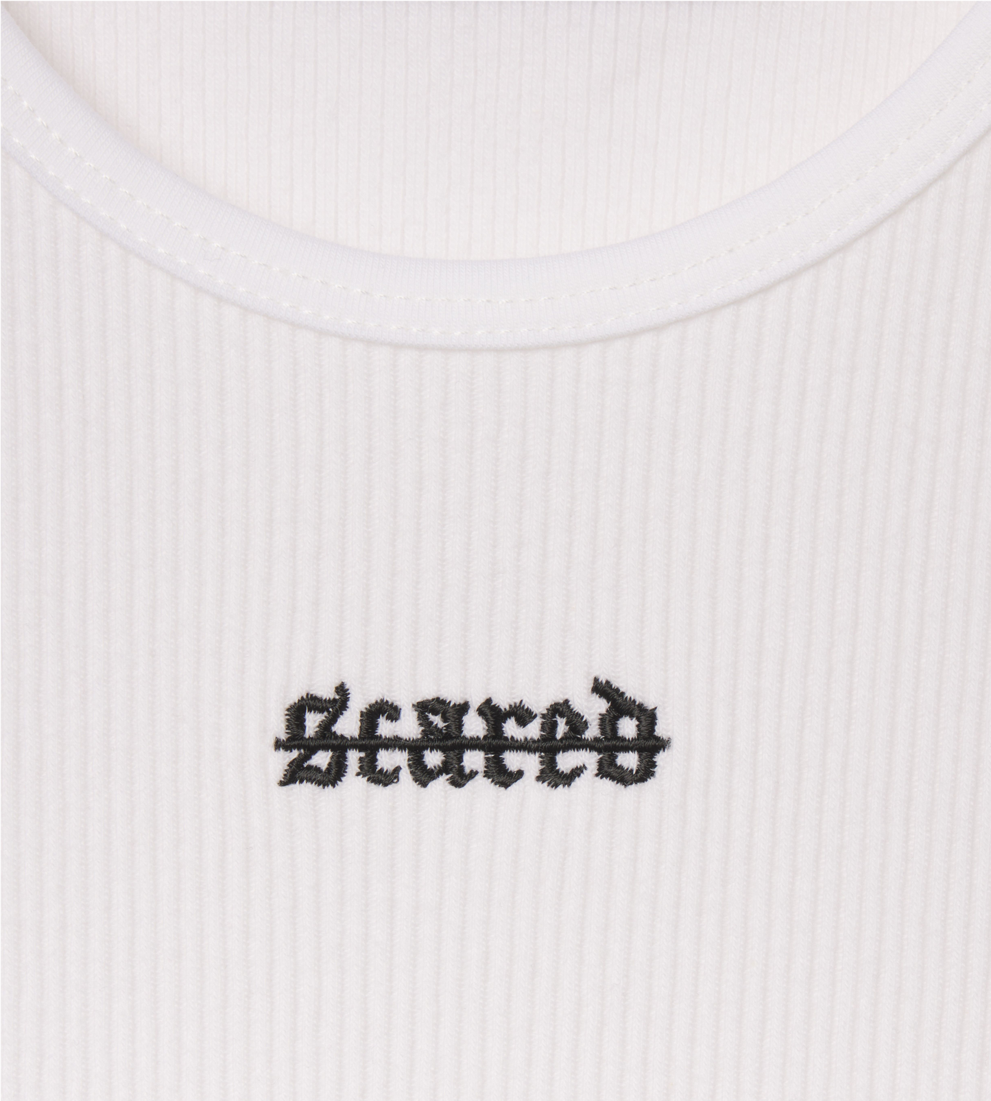 [Color: White Space] A flat lay image of the Ibiza Rib Tank, zoomed in on the logo print