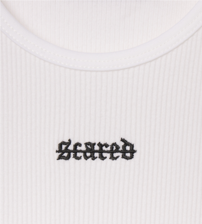 [Color: White Space] A flat lay image of the Ibiza Rib Tank, zoomed in on the logo print