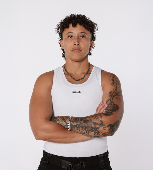 [Color: White Space] Model wearing the Ibiza rib tank and the Dubai jogger