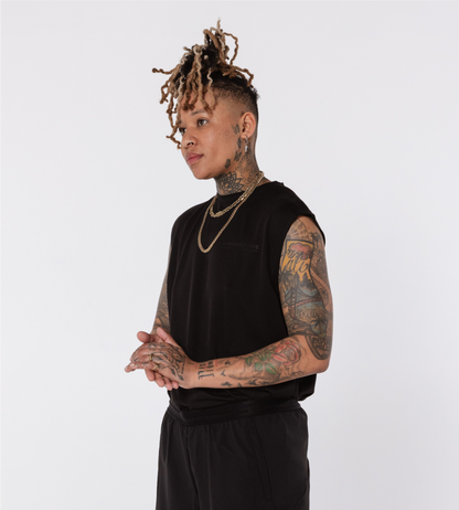[Color: Black Out] An angled image of a model wearing the Stockholm Tank