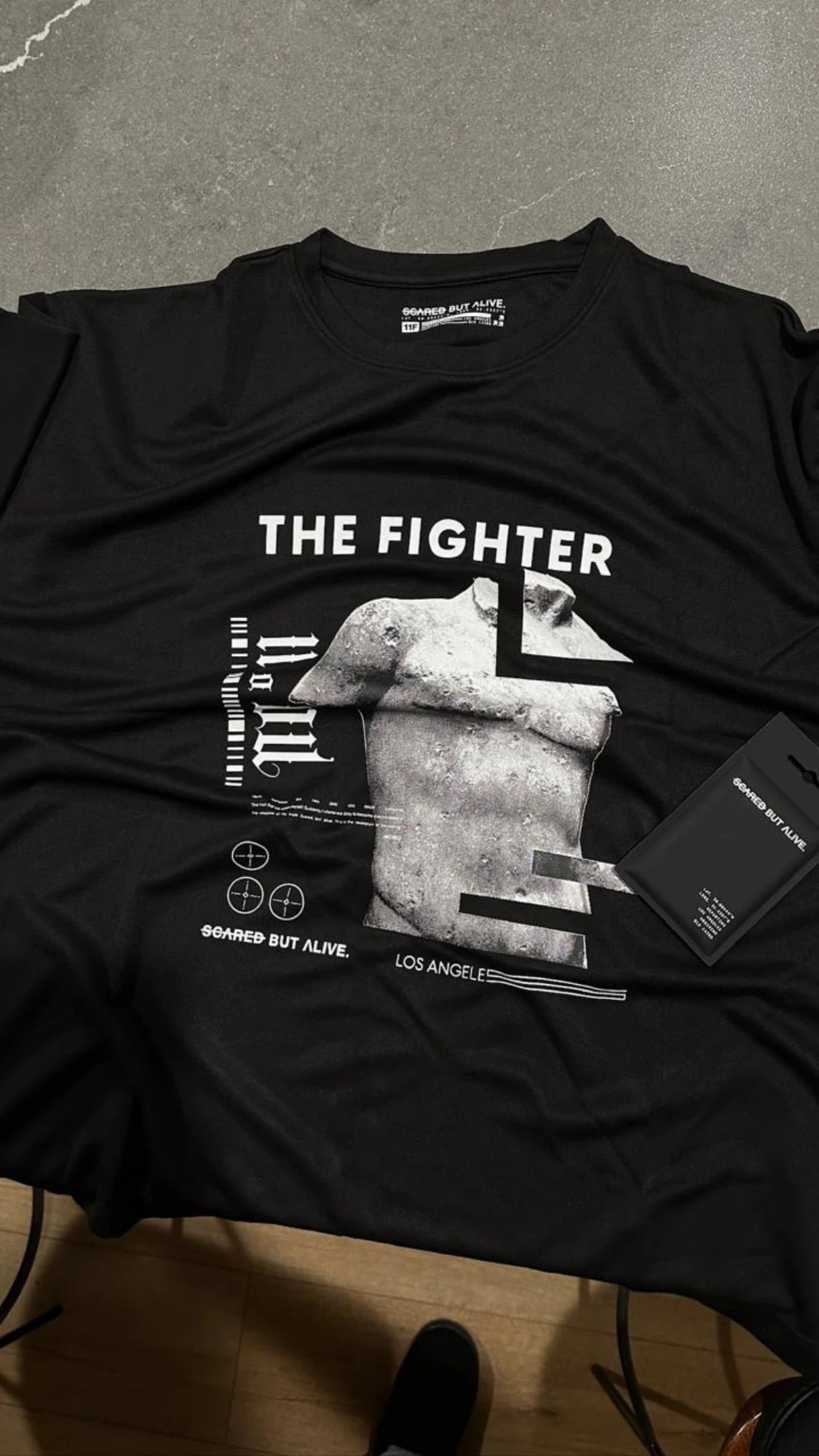 The Fighter graphic up close with hangtag