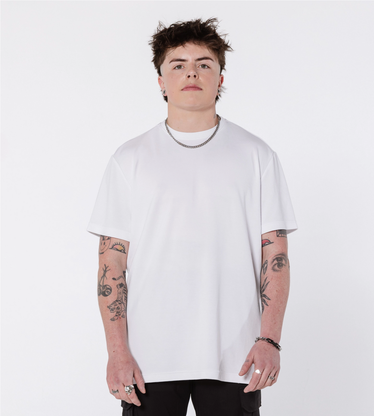 Bristol Tee White Space front street fit by black fence