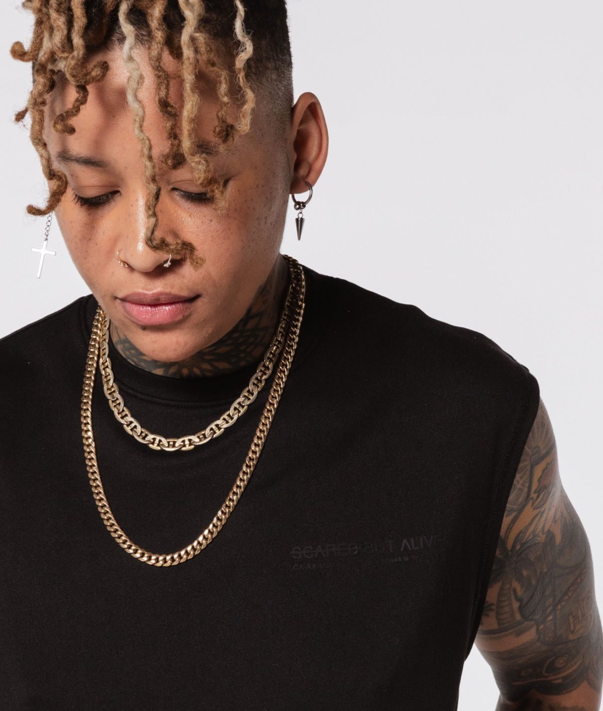 Stockholm Tank Black Out close fit with raised tonal chest graphic